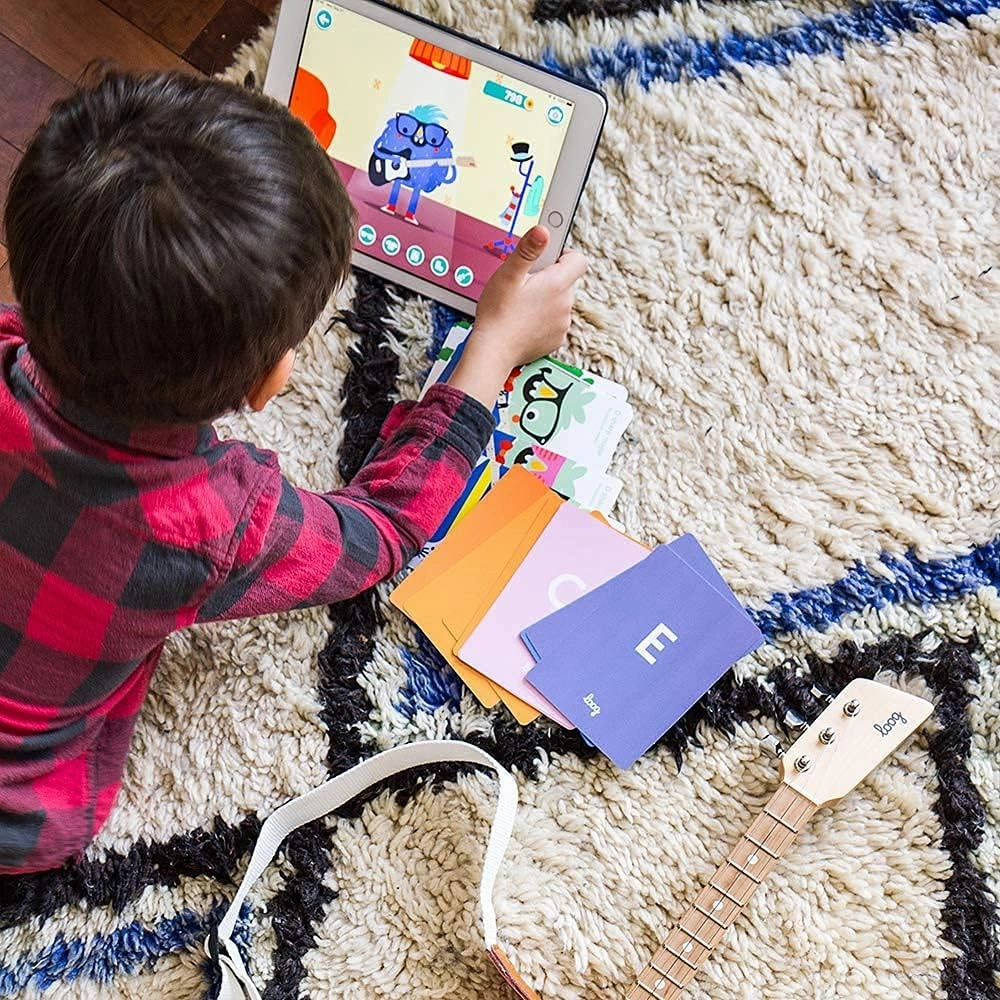 Loog Mini Electric kids Guitar for Beginners built-in Amp Ages 3  Learning App and Lessons Included Yellow