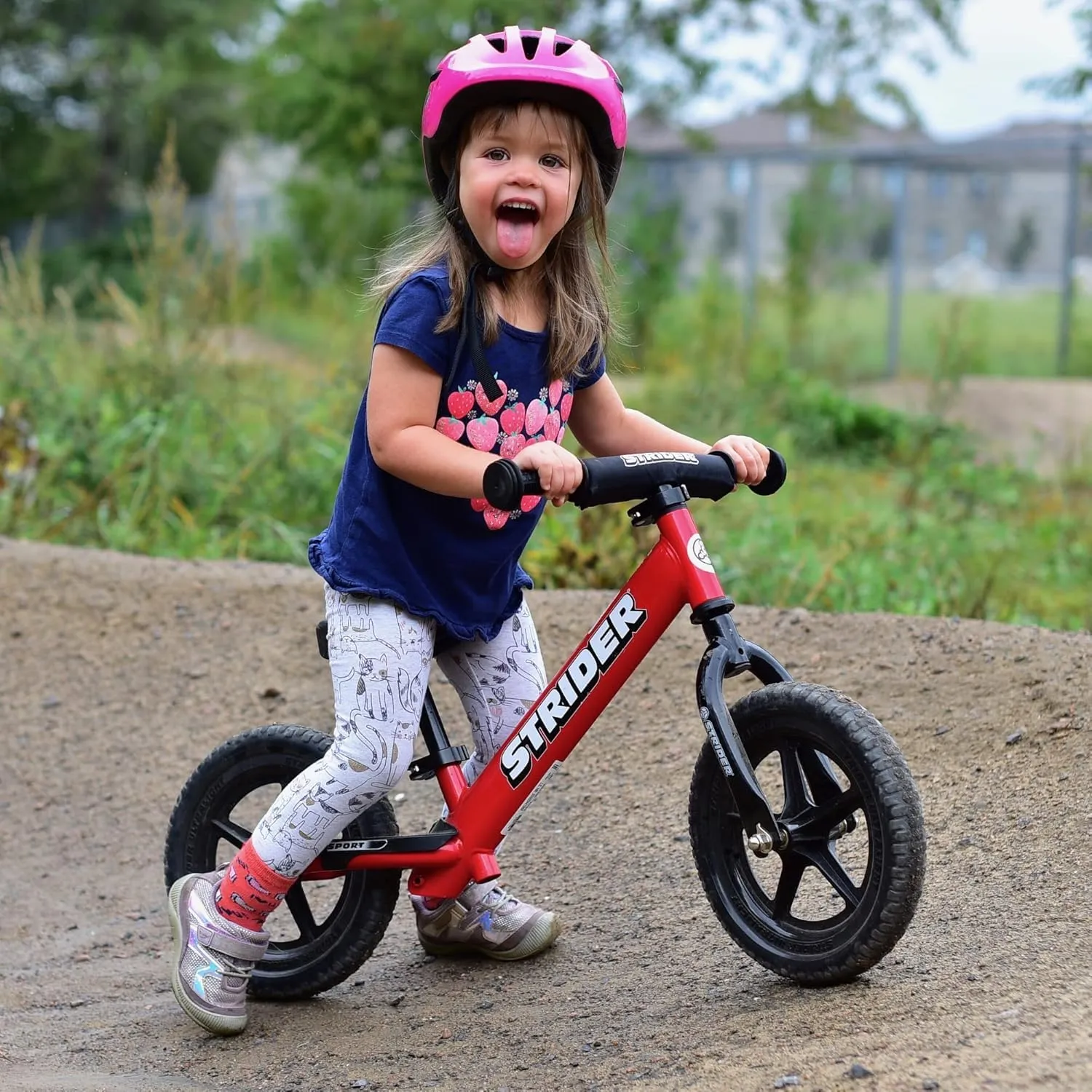 Strider 12” Sport Bike - No Pedal Balance Bicycle for Kids 1 to 4 Years - Includes Safety Pad, Padded Seat, Mini Grips & Flat-Free Tires - Tool-Free Assembly & Adjustments