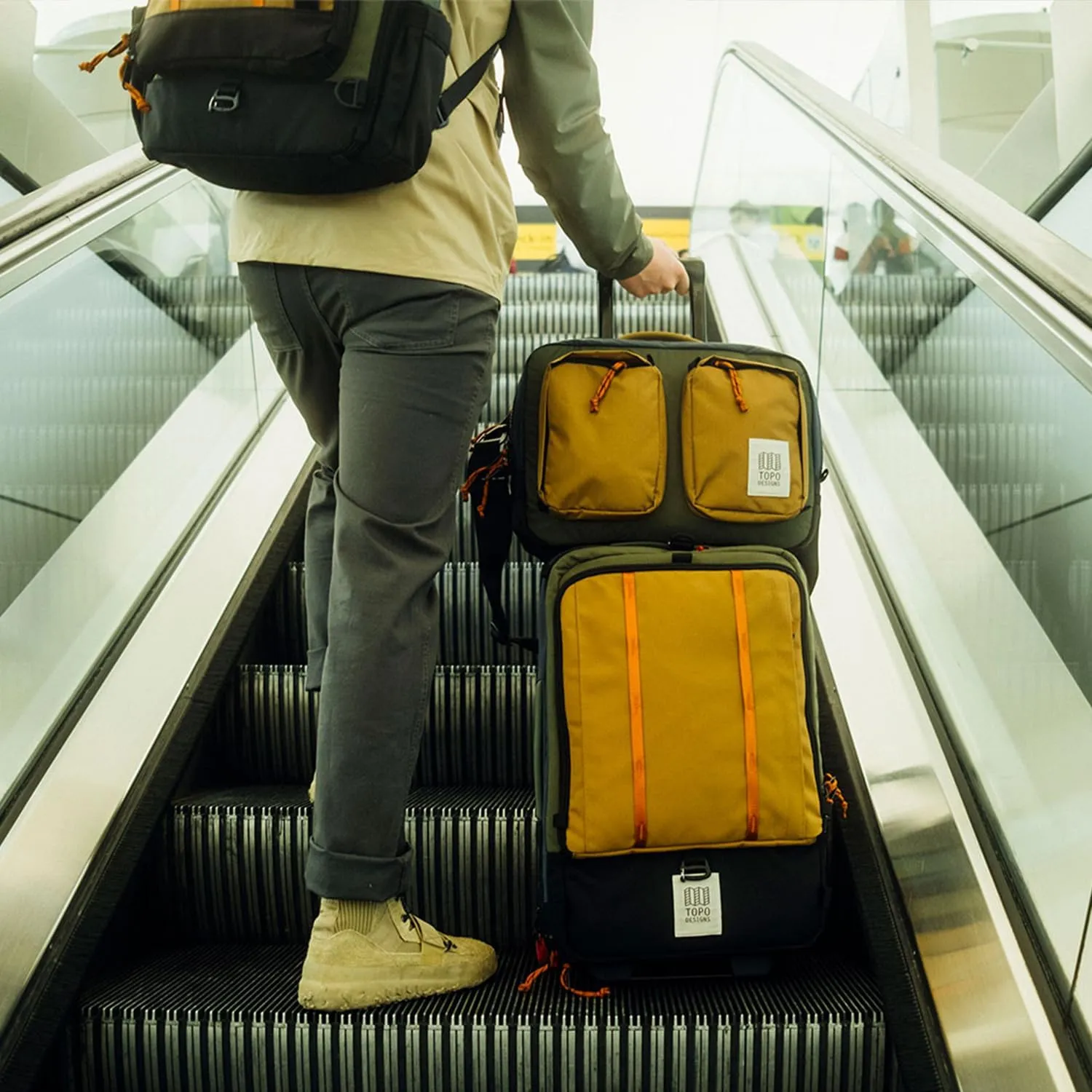 Topo Designs Global Travel Roller Bag Suitcase, 44L Carry-On, 3 Handles, Smooth Heavy Duty Wheels, Telescoping Handle, Durable   Rugged, WRAP Certified (Navy/Sahara)
